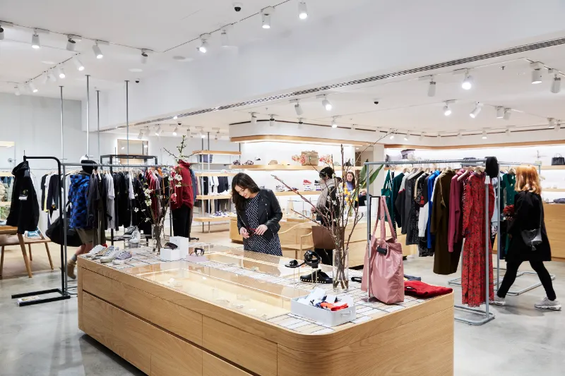 Shoppers browsing a rail of clothing in a Melbourne boutique